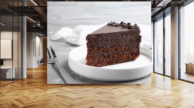 Delicious fresh chocolate cake served on grey table, closeup Wall mural