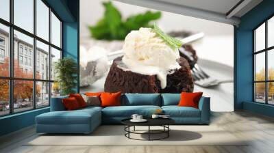 Delicious fresh fondant with hot chocolate, ice cream  and mint served on plate, closeup Wall mural