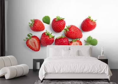 Delicious fresh red strawberries and green leaves on white background, top view Wall mural