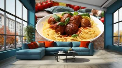 Delicious pasta with meatballs and ingredients on wooden table, closeup Wall mural