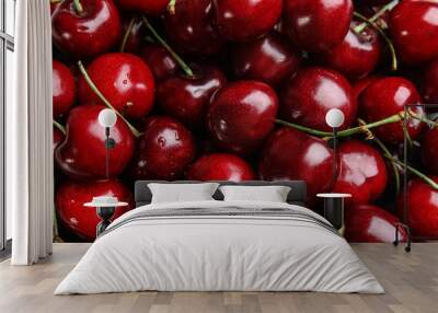 Delicious ripe sweet cherries as background, top view Wall mural