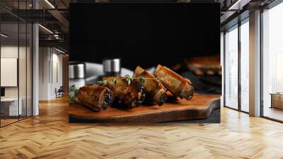 Delicious roasted ribs served on wooden board Wall mural