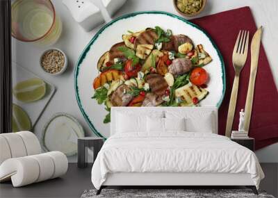 Delicious salad with beef tongue, grilled vegetables, peach and blue cheese on white table, flat lay Wall mural