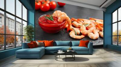 Delicious shrimp cocktail with tomato sauce served on black table Wall mural