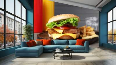 Delicious tofu burger served with french fries on grey wooden table Wall mural