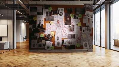 Detective board with fingerprints, photos, map and clues connected by red string on white brick wall Wall mural