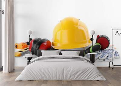 Different construction tools and hard hat isolated on white Wall mural