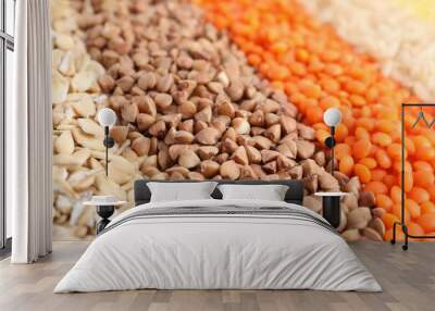 Different grains and cereals as background, closeup Wall mural