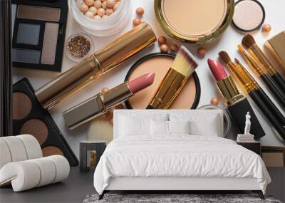 Different luxury makeup products on white background, top view Wall mural