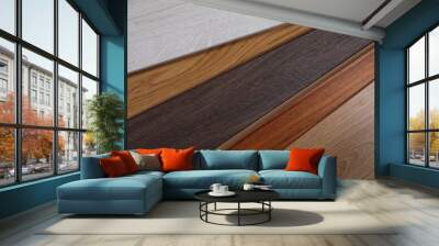 Different samples of wooden flooring as background, closeup Wall mural