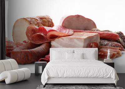 Different tasty meat delicacies on white background Wall mural