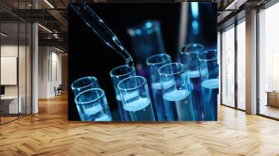 Dripping reagent into test tube on black background, closeup. Laboratory analysis Wall mural