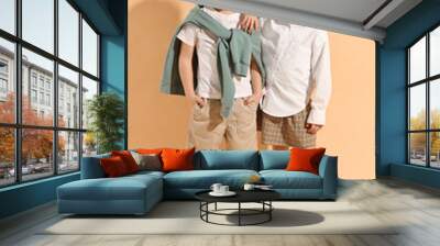 fashion concept. stylish children on pale orange background Wall mural