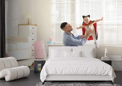 Father playing with his child at home Wall mural