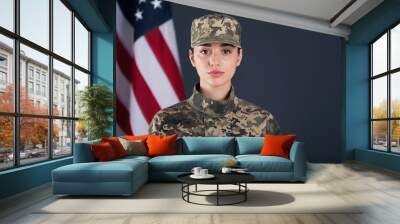 Female American soldier and flag of USA on dark background. Military service Wall mural