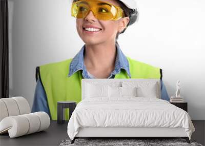 Female industrial engineer in uniform with clipboard on white background. Safety equipment Wall mural