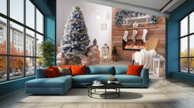 Festive interior with decorated Christmas tree and fireplace Wall mural