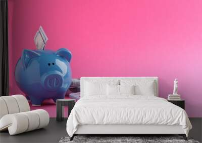 Financial savings. Piggy bank, dollar banknotes, glasses and calculator on pink background Wall mural