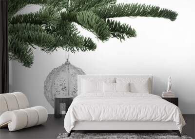 Fir tree branch with Christmas ball on white background Wall mural