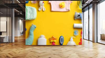 Flat lay composition with baby accessories and space for text on color background Wall mural