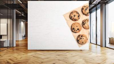 Flat lay composition with chocolate cookies and space for text on light background Wall mural