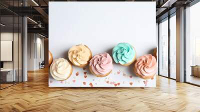 flat lay composition with delicious birthday cupcakes and space for text on white background Wall mural