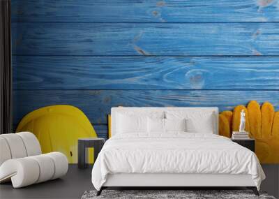 Flat lay composition with different construction tools and space for text on color wooden background Wall mural