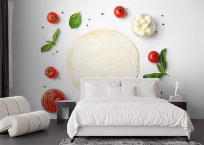 Flat lay composition with dough and fresh ingredients for pizza on white background Wall mural