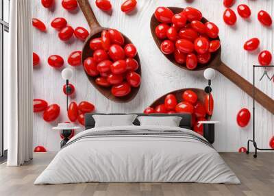 Flat lay composition with fresh ripe goji berries on white wooden table Wall mural