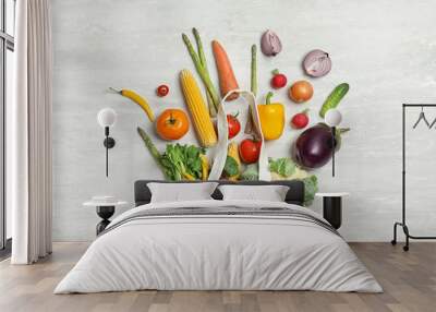 Flat lay composition with fresh vegetables on light background Wall mural