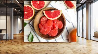 Flat lay composition with grapefruits on wooden background Wall mural