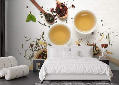 Flat lay composition with green tea on white wooden table Wall mural