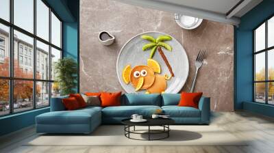 Flat lay composition with pancakes in form of elephant on grey background. Creative breakfast ideas for kids Wall mural