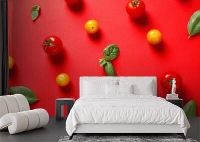 Flat lay composition with ripe cherry tomatoes and basil leaves on color background Wall mural