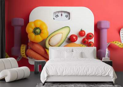 Flat lay composition with scales and healthy food on red background Wall mural