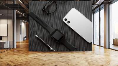 Flat lay composition with stylish smart watch on black table Wall mural