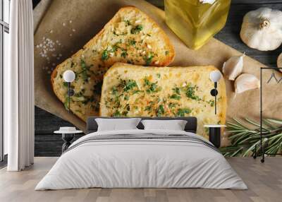 Flat lay composition with tasty garlic bread on table Wall mural