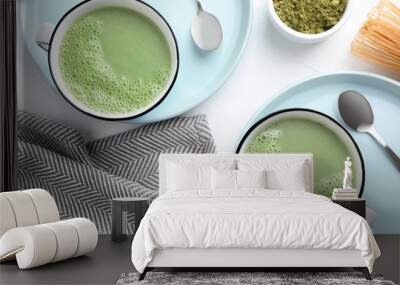 Flat lay composition with tasty matcha green tea latte on white table Wall mural