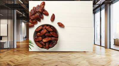 Flat lay composition with tasty sweet dried dates on white wooden table. Space for text Wall mural