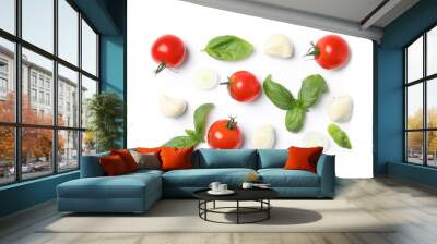 Fresh green basil leaves, cherry tomatoes and mozzarella on white background, top view Wall mural