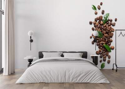 Fresh green coffee leaves and beans on light background, flat lay. Space for text Wall mural