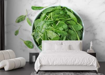 Fresh green healthy spinach on marble table, flat lay Wall mural