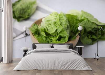 Fresh green romaine lettuces on grey table Wall mural