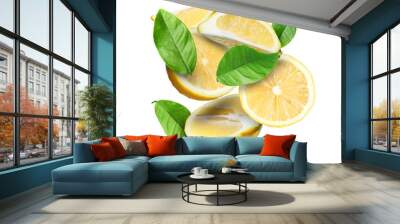 Fresh juicy lemons and green leaves falling on white background Wall mural