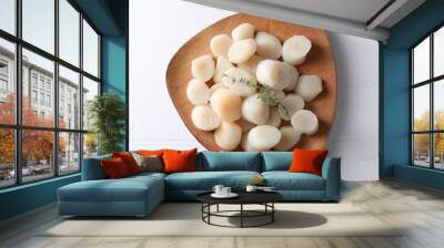 Fresh raw scallops and thyme on white wooden table, top view Wall mural