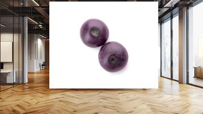 Fresh ripe acai berries isolated on white, top view Wall mural