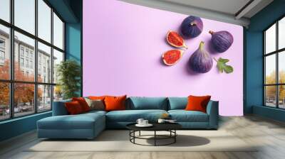 Fresh ripe figs on light background, top view. Space for text Wall mural