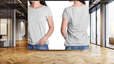 Front and back views of young woman in grey t-shirt on white background. Mockup for design Wall mural