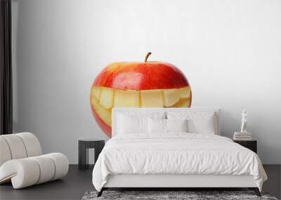 Funny smiling apple on white background Wall mural