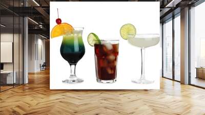 Glasses of traditional alcoholic cocktails on white background Wall mural